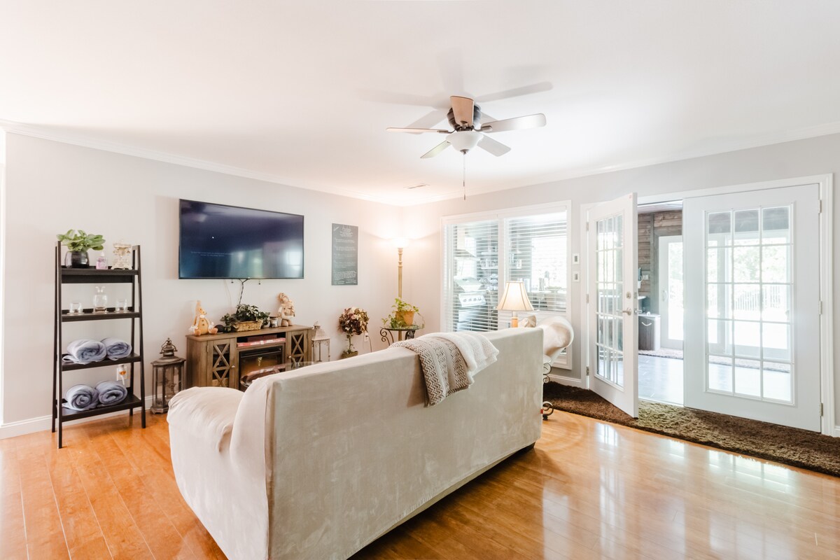Downstairs living room with rear-entry doors